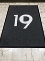 Custom Made ToughTop Logo Mat Spinaker Real Estate Partners of Norwalk Connecticut